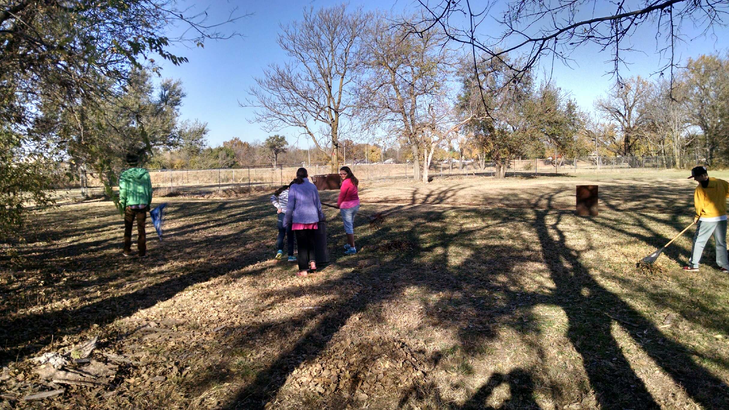 The group raked up leaves which will be used to enrich the soil for future crops. 