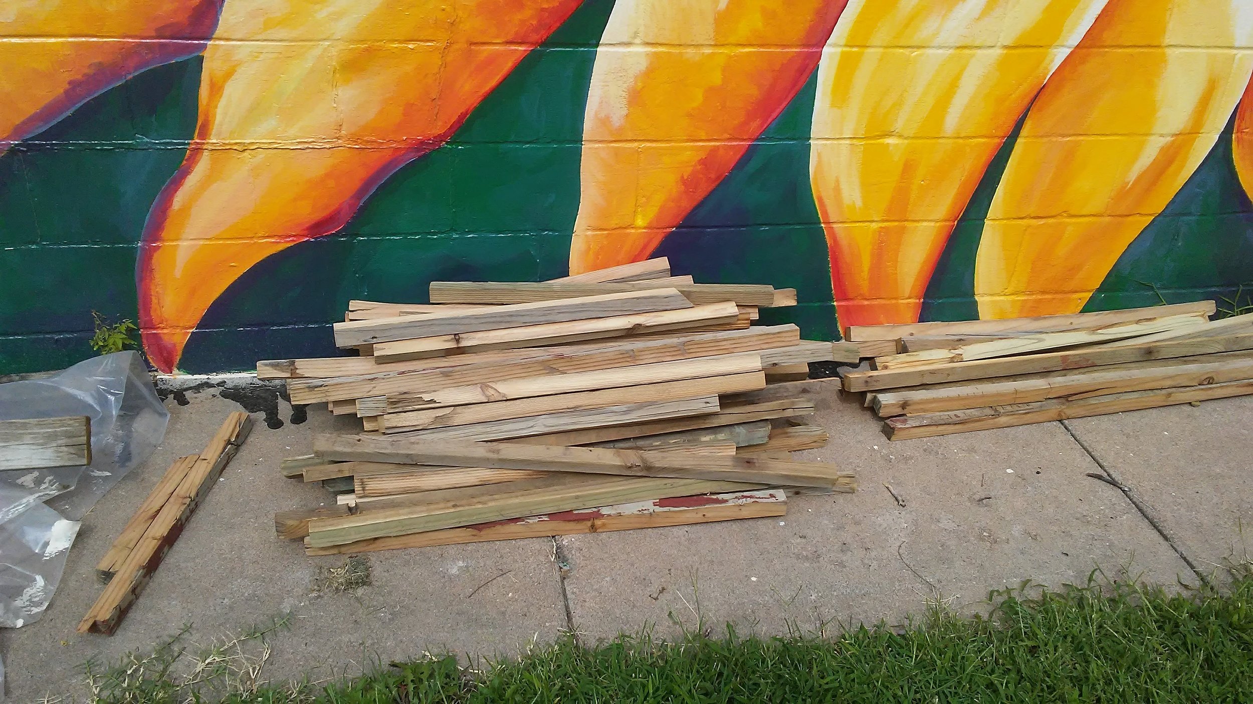 These 2"x 2" boards will become framing for garden boxes!