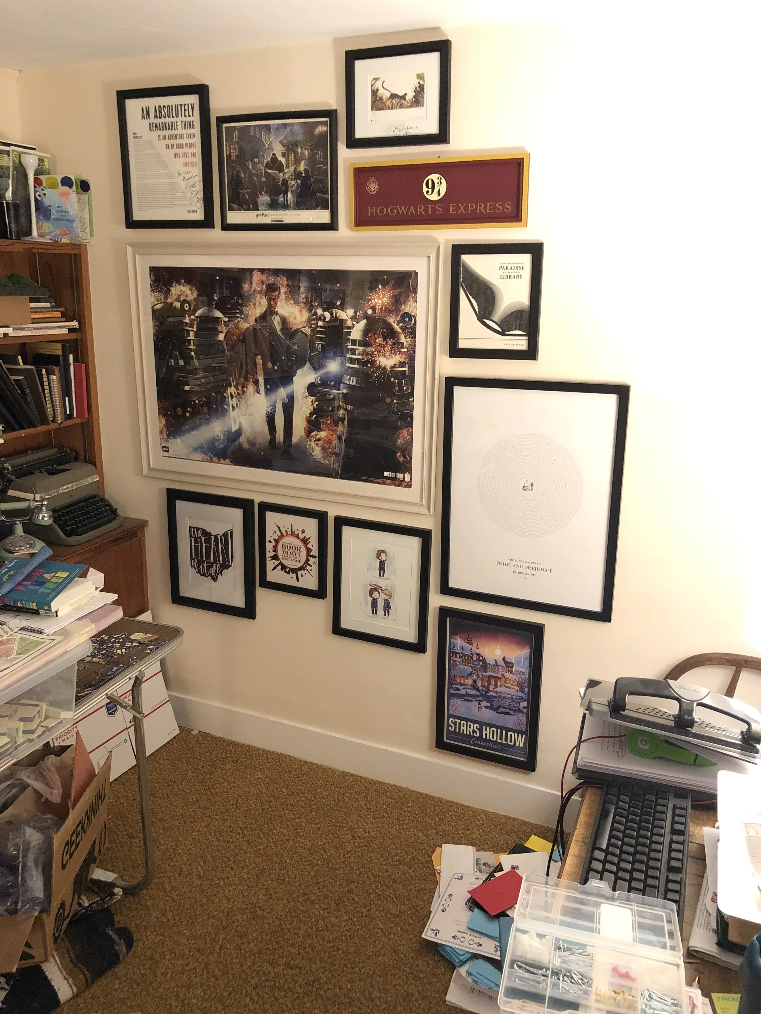 This isn't everything because the one thing HomeGoods weirdly didn't have all the frames I needed. I guess we'll just have to go back... 