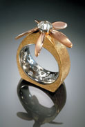 "Up, Up, and Away" in platinum, 18k yellow and red gold, and diamonds