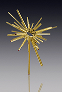 "Kaboom Ring" in 18k yellow gold, rubies