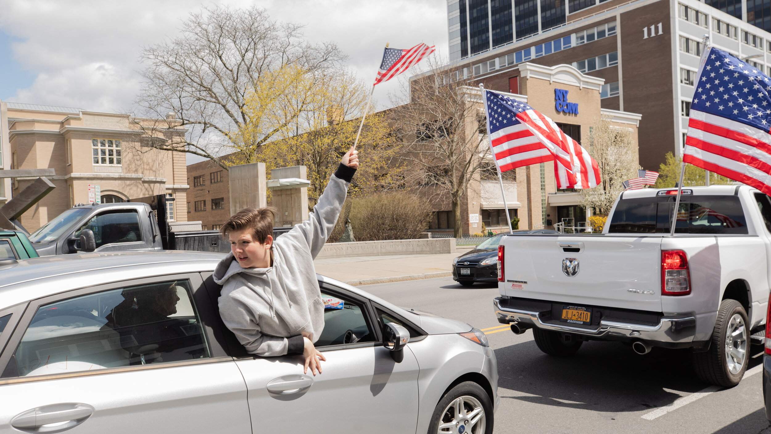  A child waves the American flag. 