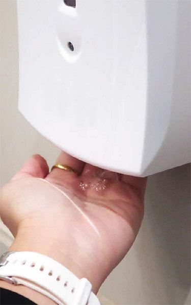  Easy, hands free dispenser works with the motion of your hand . . . 