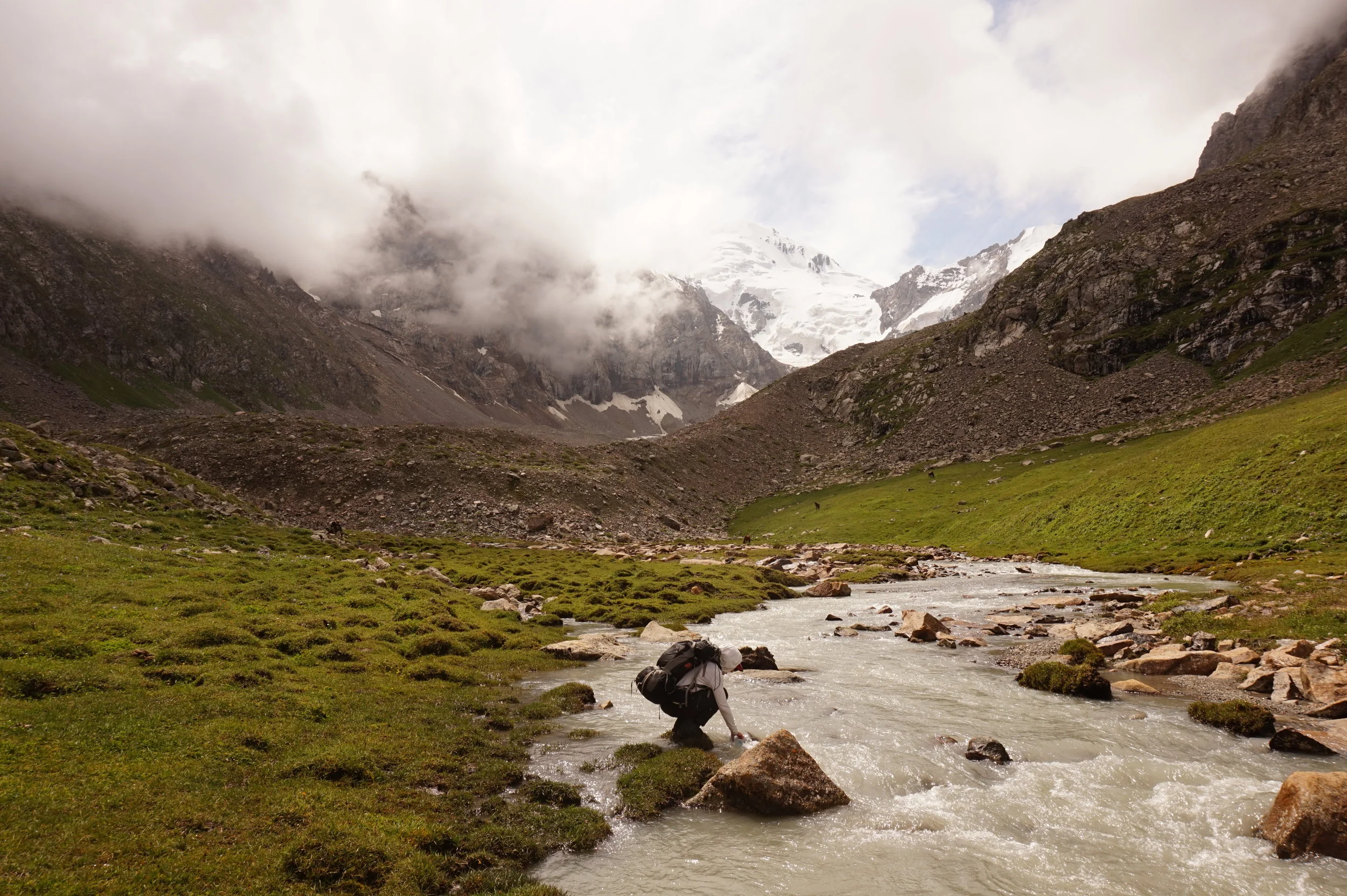 Alice Hill taking water samples below the Karabatkak Glacier, Kyrgyzstan.