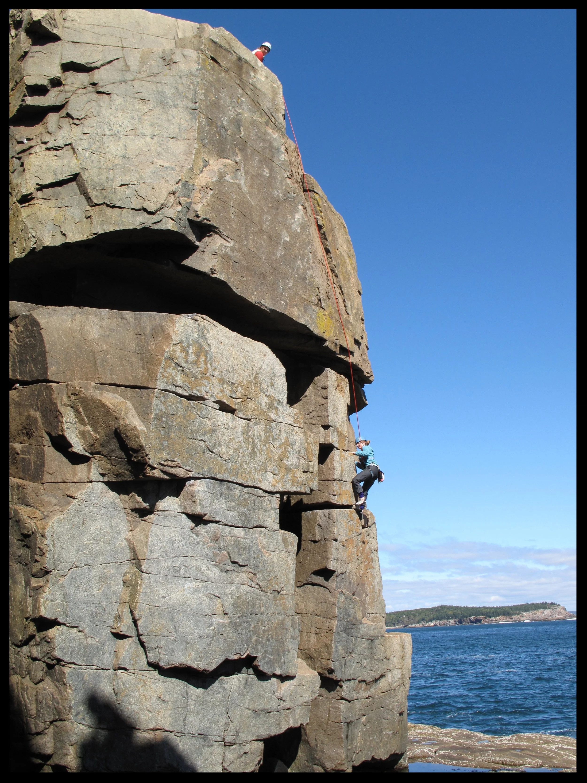 Climbing environments often make communication difficult. The sound of the ocean, in this case, makes it important address the fundamental principles of effective climber communication before the climbing starts.