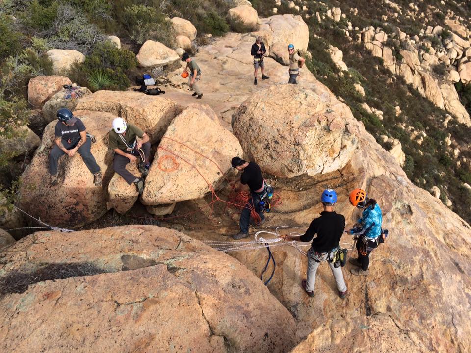 AAC Instructors Mark Kneisel (blue helmet) and Jesse Toedtman (white helmet) working natural toprope anchors with AAC Members Marsha Texeira, Matt Cascio and Melissa Angeles. Photo cred: Piotr Andrzejczak