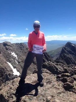 Jen Staufer on the summit of Crestone Peak before the accident.