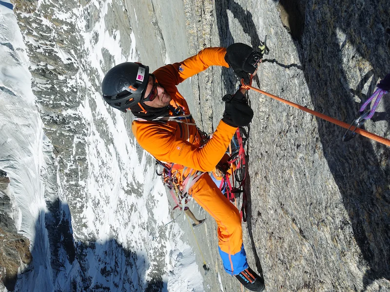 Siegrist cleaning a stretch of hooking during the six-day ascent of Cerro Kishtwar's northwest face.