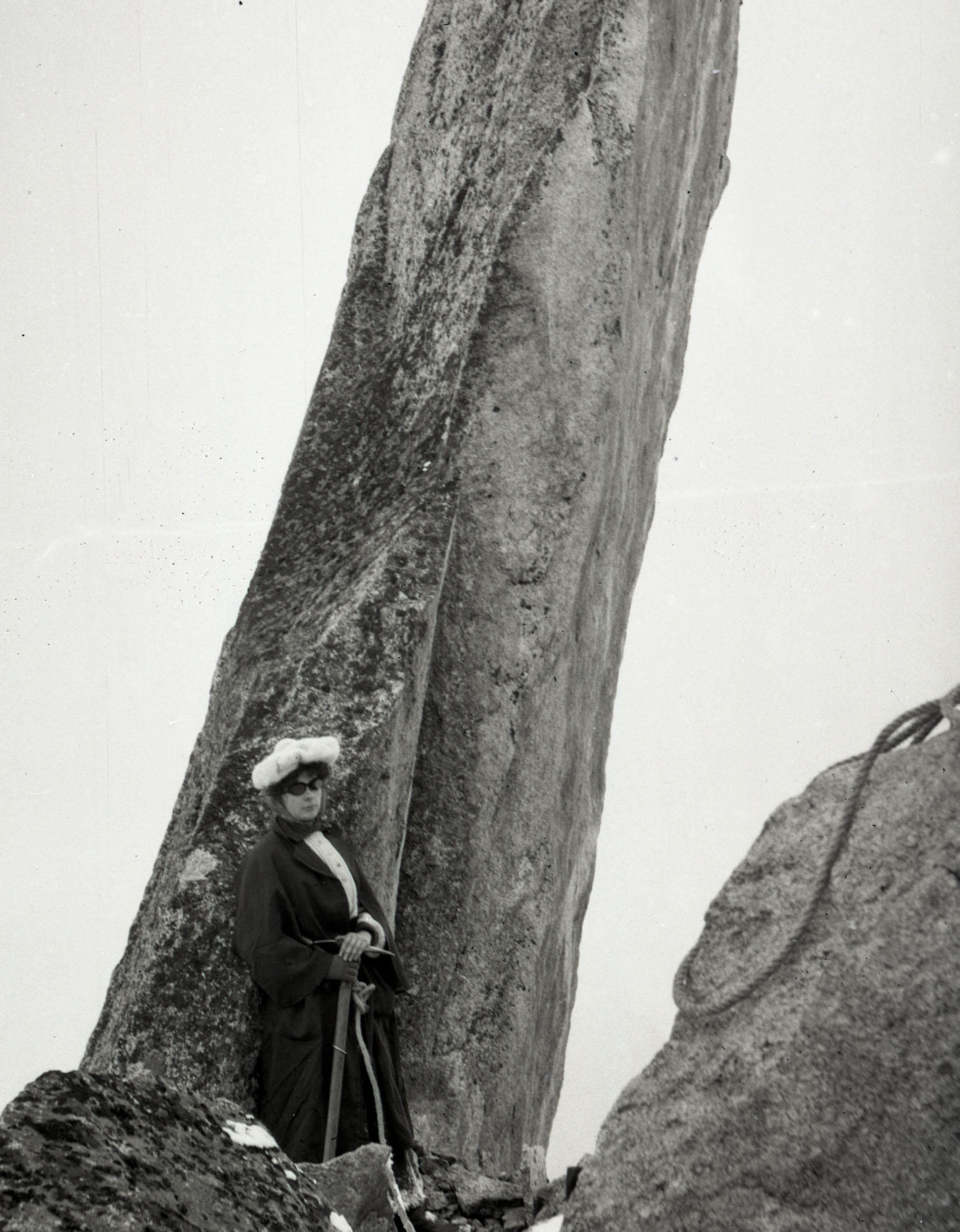 A woman summiting in the Alps circa 1911