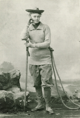  Annie Peck, professional mountaineer, wearing her mountaineering attire in a promotional photograph in 1895. 