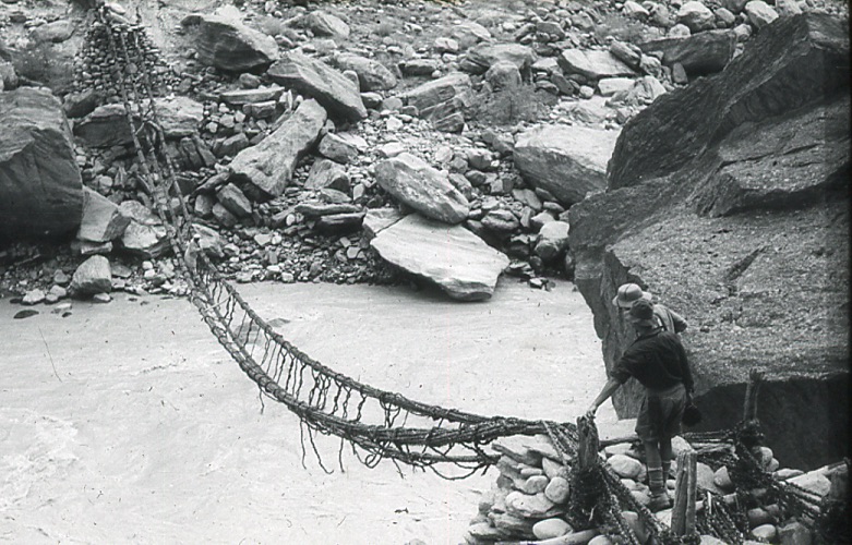 Rope bridge on the approach to K2. Eaton Cromwell Collection