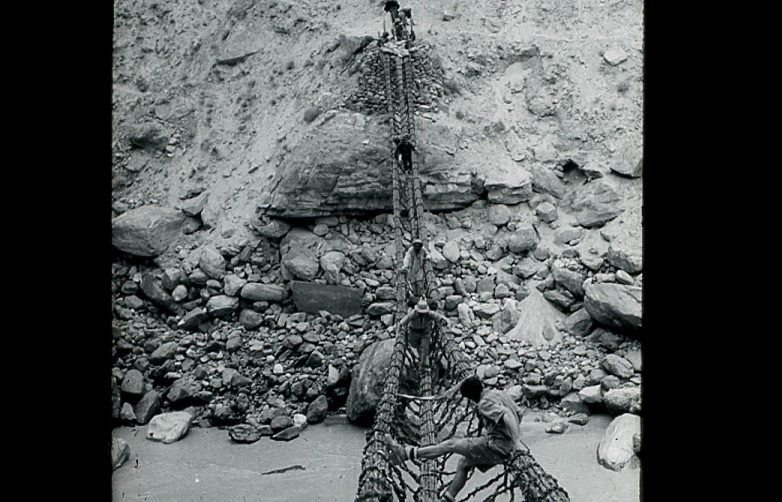 Rope bridge on the approach to K2. Eaton Cromwell Collection