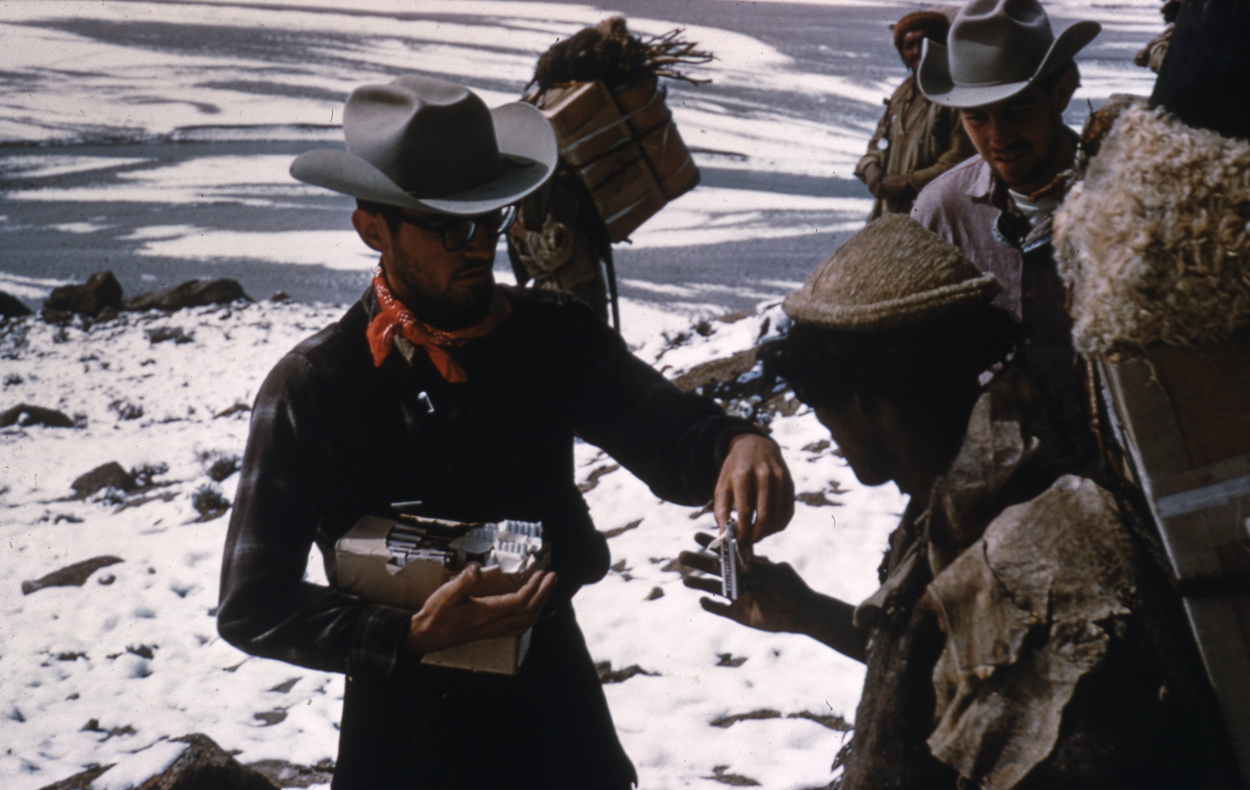  The expedition had too few cigarettes to meet the required amount for the porters. A crisis was averted by trading their Camel cigarettes for local brands at a rate of 2 to 1. 