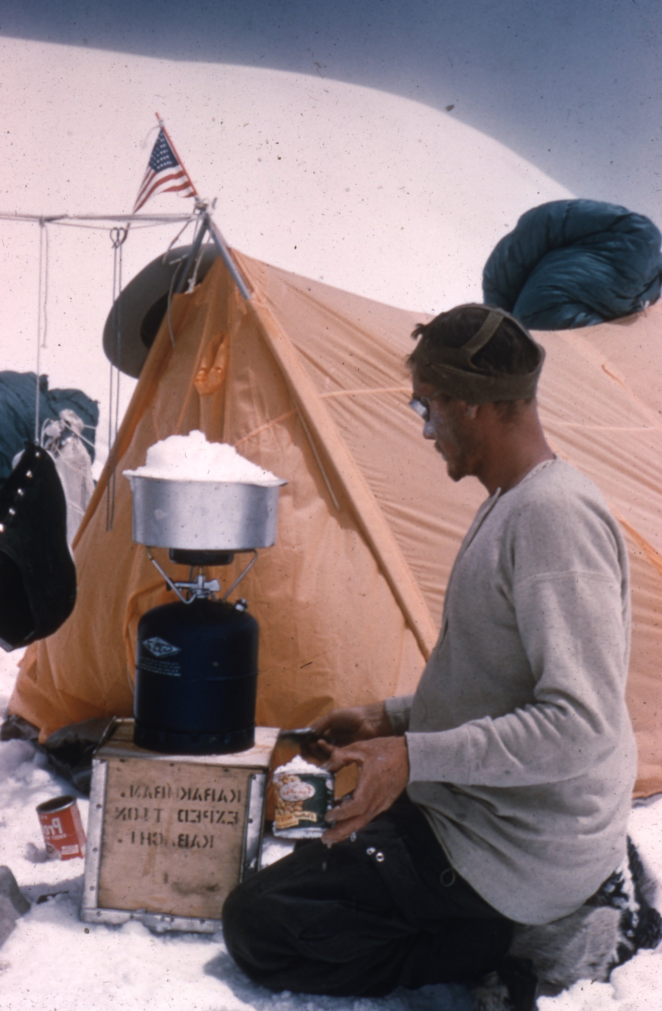  In this photo you can see one of the expedition’s wooden food boxes. The sides would be used to create make shift snowshoes on summit day 