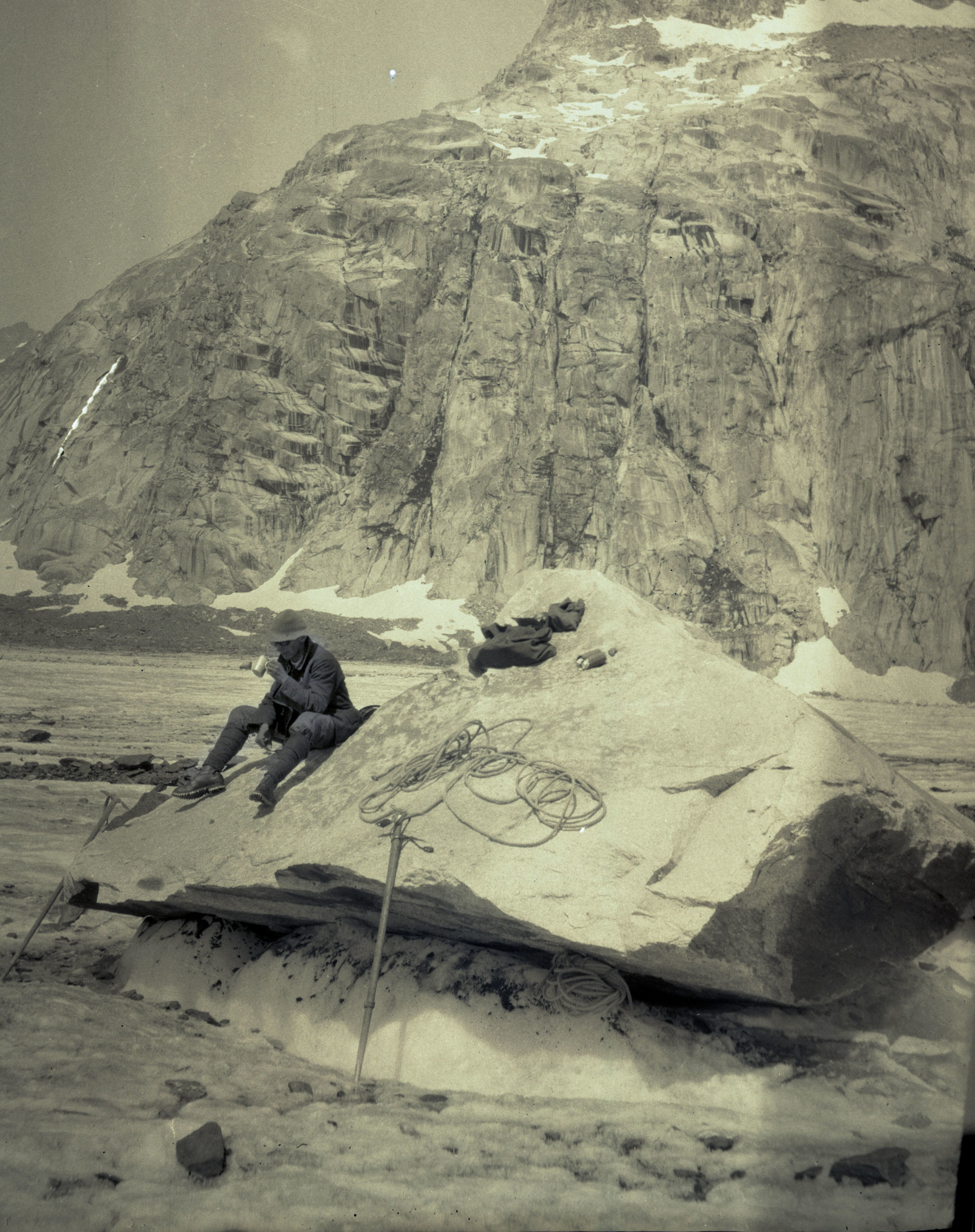  Hemp rope, ice axes and other gear spread out on a glacial table. 