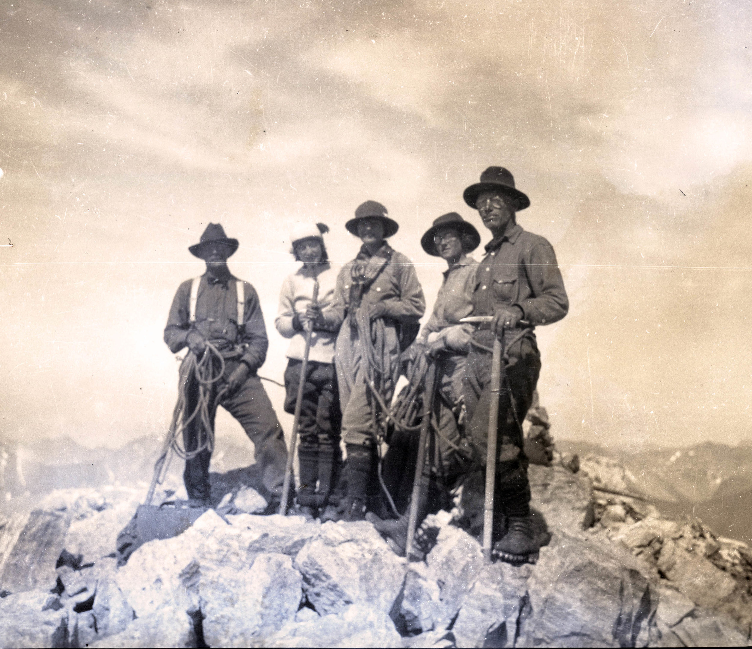 Men and women on the summit