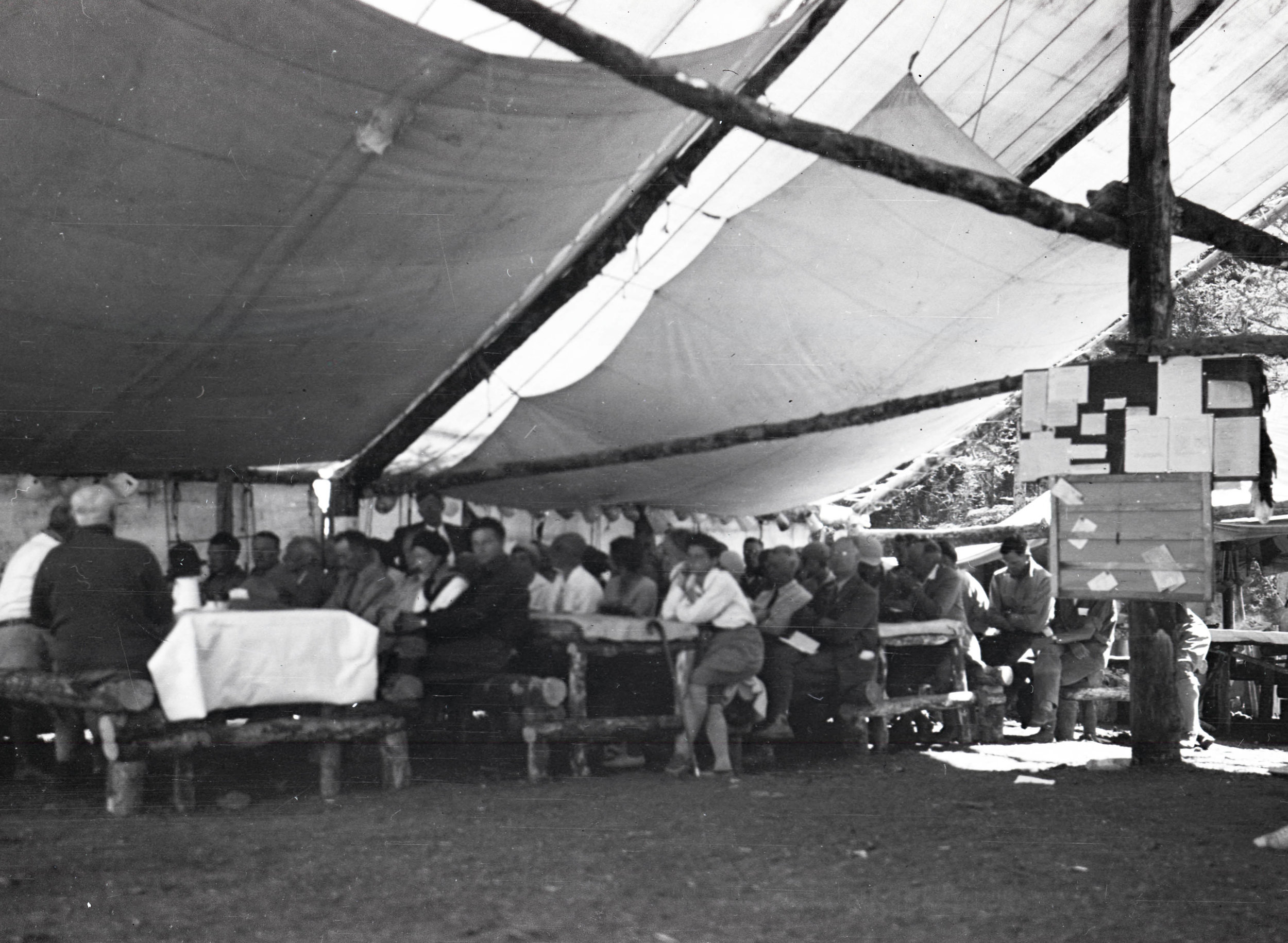  Campers gathering in a mess tent 