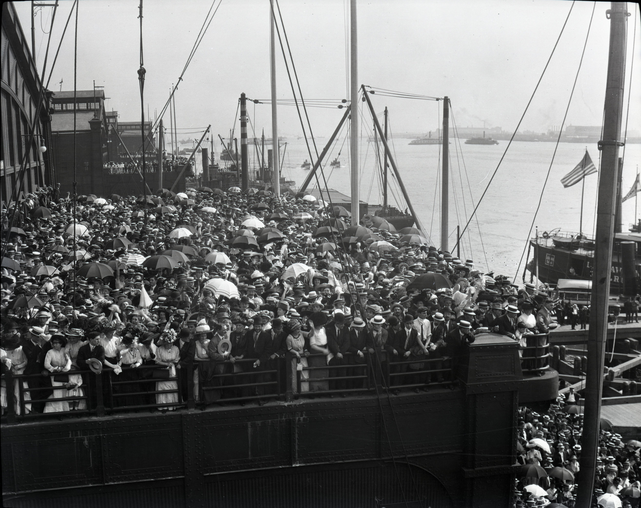  A crowd on Pier 59 in New York City where ships arrived or left 