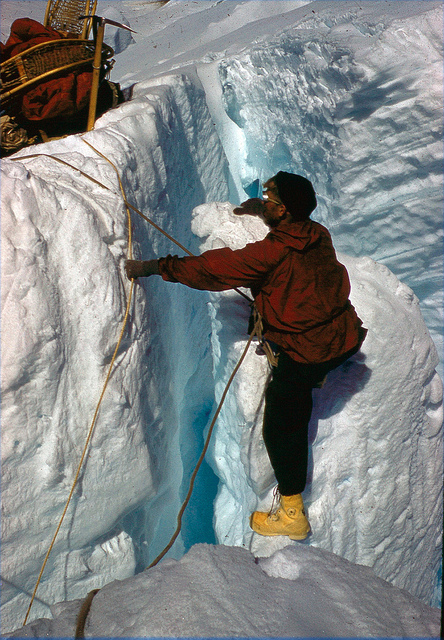  We crossed a few more crevasses on somewhat doubtful bridges, veered to the right under the hanging glaciers of the Kahiltna Horns, and put our snowshoes back on for the more amenable crevasses leading to the base of the Rock Ridge.     