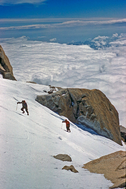  In an hour, we had   picked our way over a number of rotten snow bridges to what we thought was our couloir, rejected it as being too steep, and returned for lack of   anything better.     