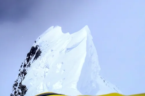 A delicate traverse to the summit of Lupghar Sar West.