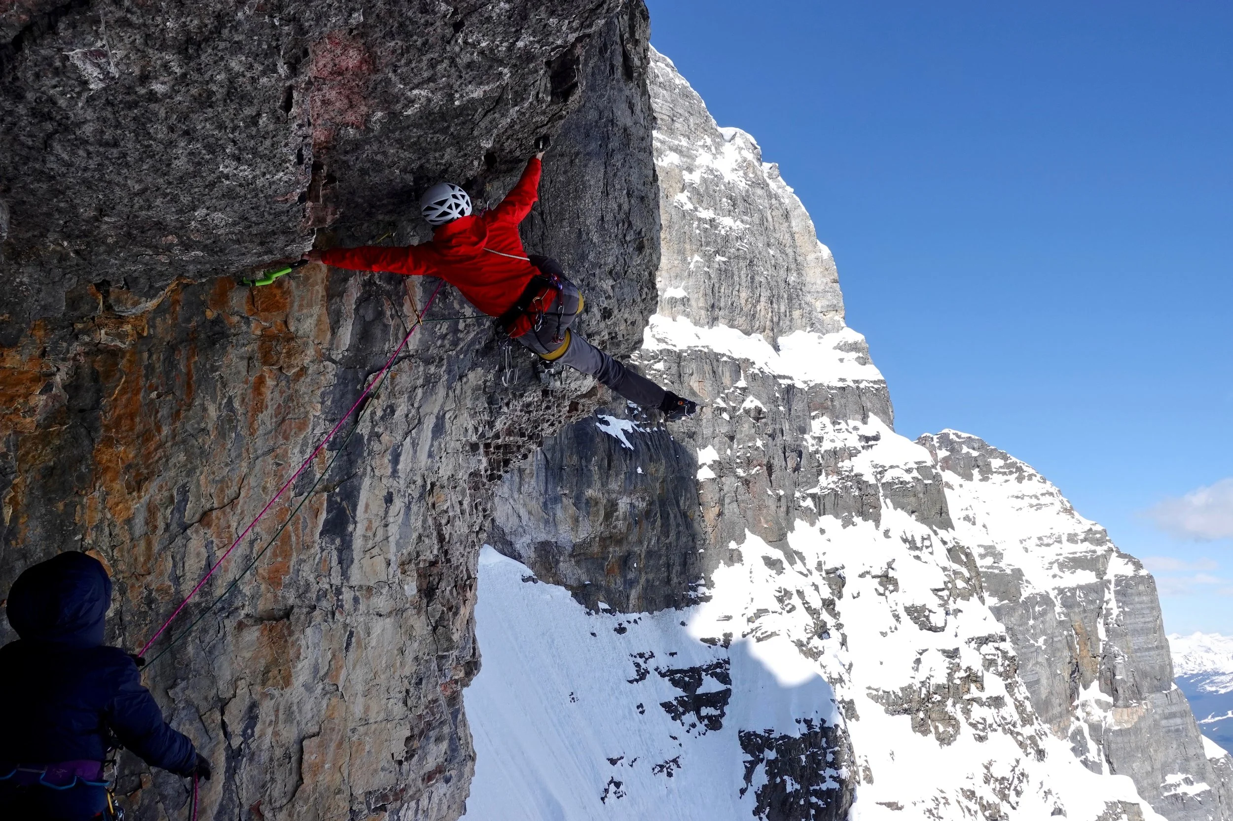 Luka Lindič firing the crux (M8) roof on the direct east face of Mt. Fay.