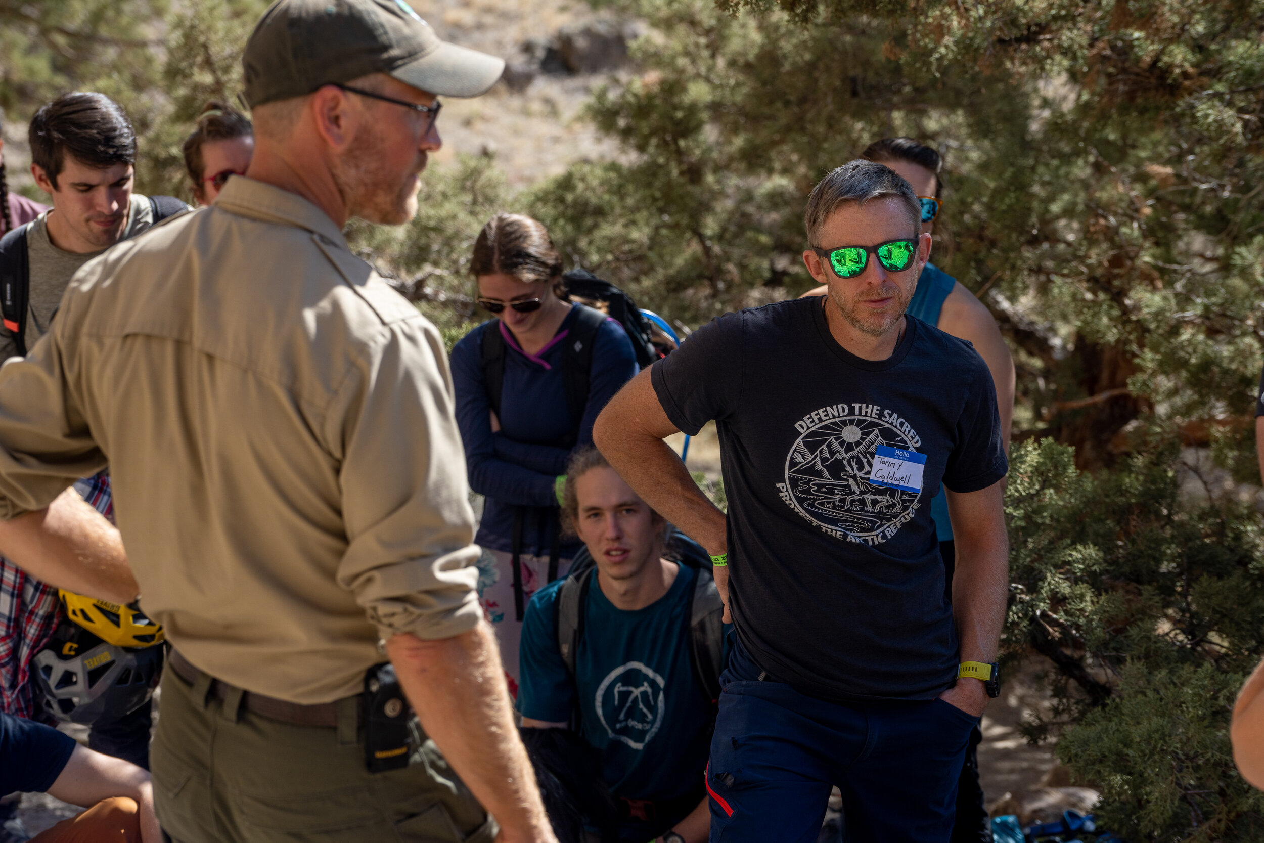 Smith Rock Superintendent Matt Davey gives a presentation as Tommy Caldwell listens