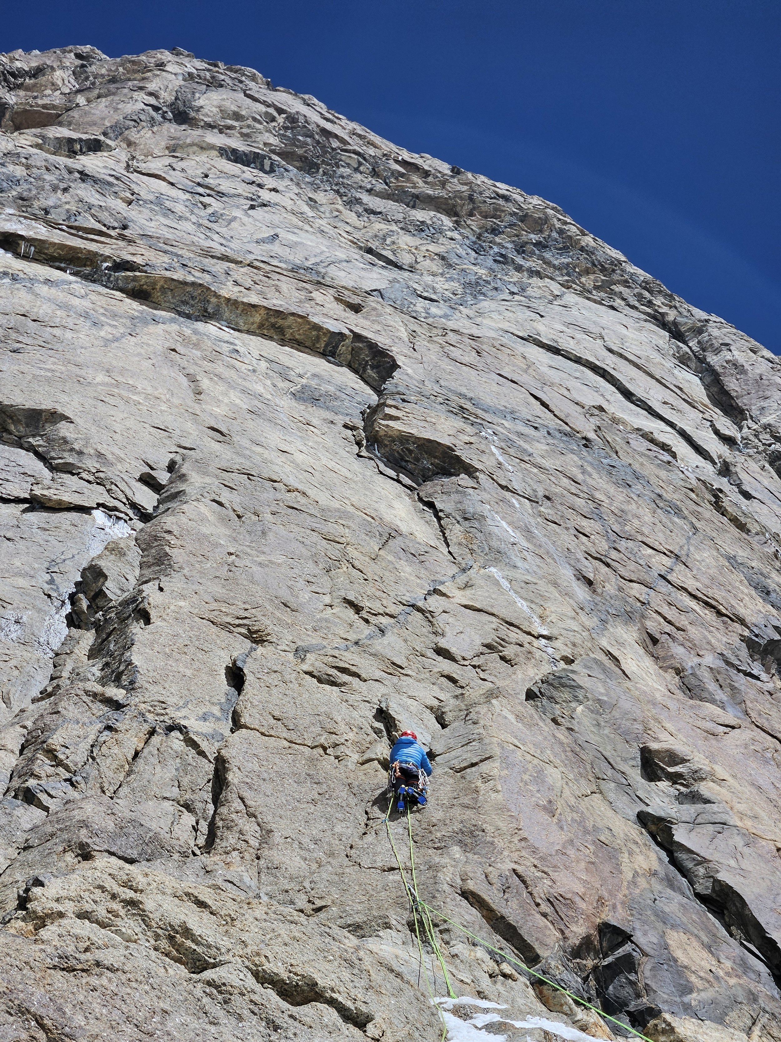 Low on the rock wall, above the initial 300-meter ice slope.