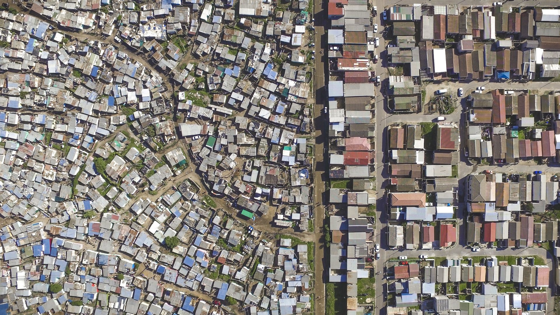Lotus Park / Mannenberg (Top) and Vukuzenzele/ Sweet Home Farm (Bottom) by Johnny Miller