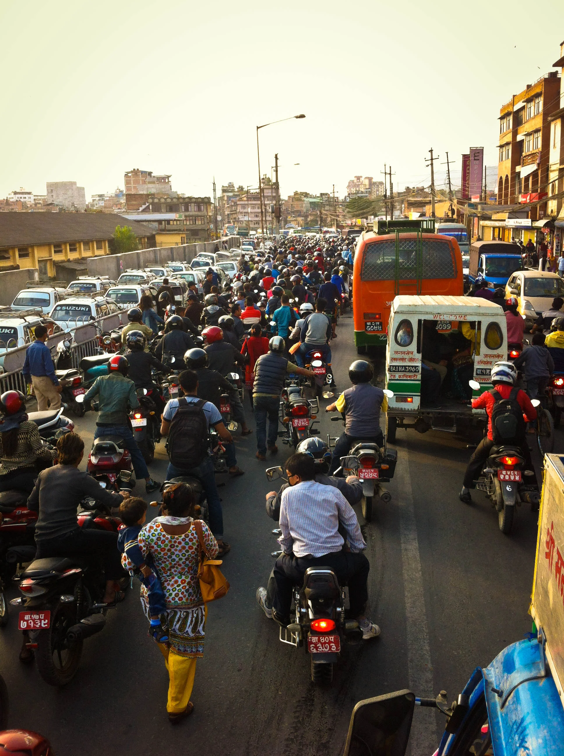 View of the cue for petrol at a station in Teku, Kathmandu. Our delivery truck had to wade through the waves of traffic for hours to finally move onto the highway to Makwanpur. 