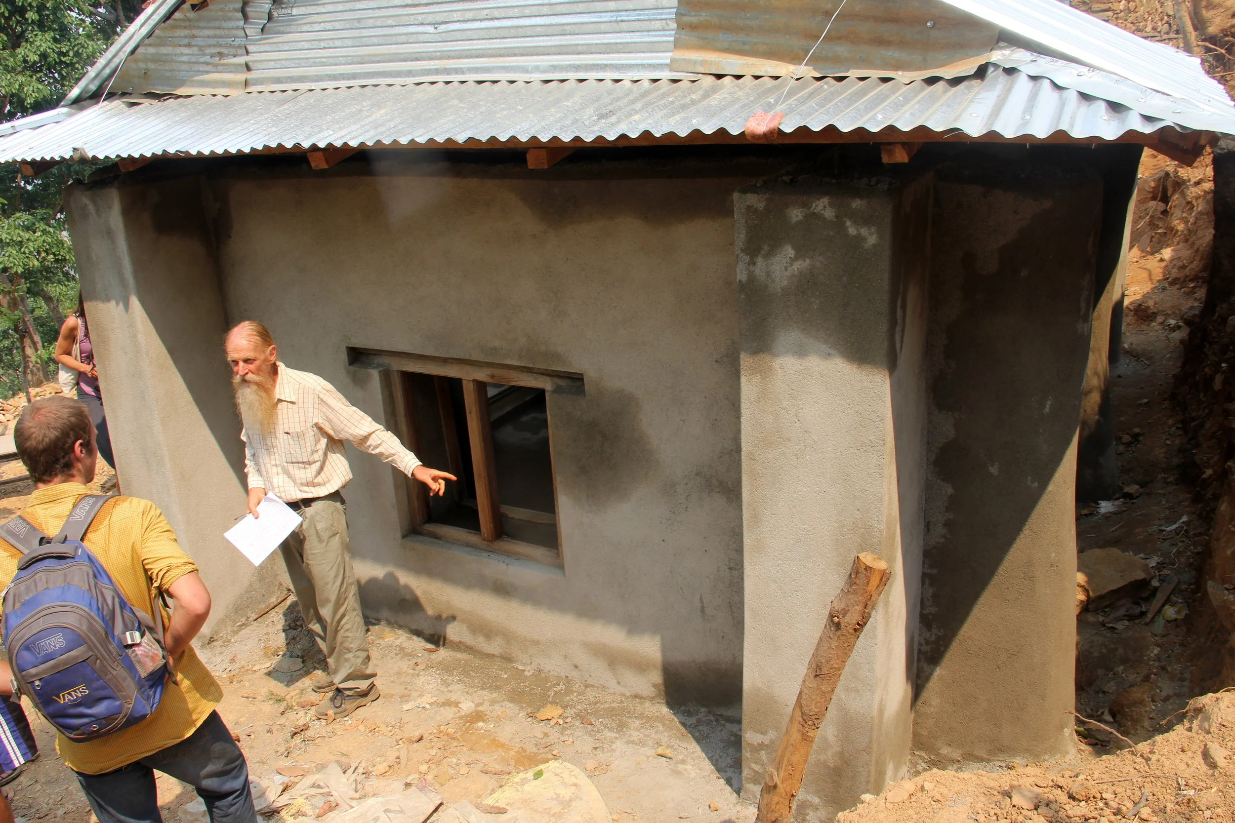 Dr. Owen Geiger inspecting Earthbag houses