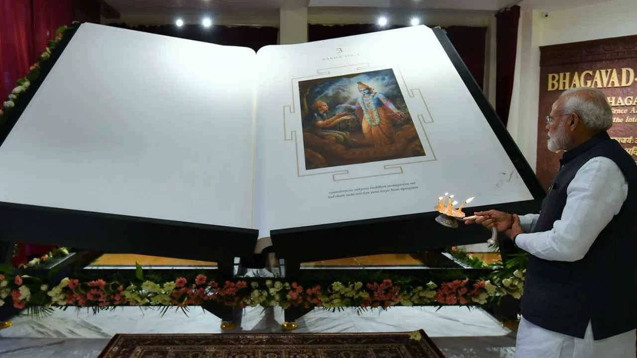 The Indian Prime Minister, Sri Narendra Modi, unveils the Bhagavad Gita, prepared by ISKCON devotees as a gift to the world, at ISKCON New Delhi on February 26, 2019.
