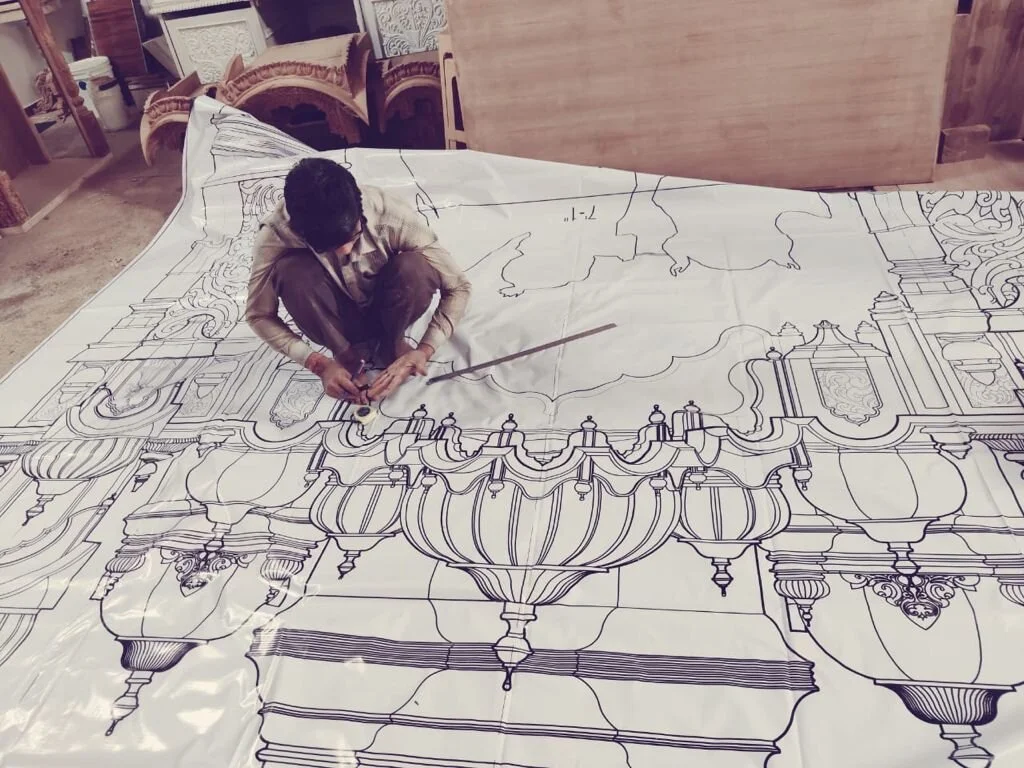 Craftsmen in India Commence Wood Carving