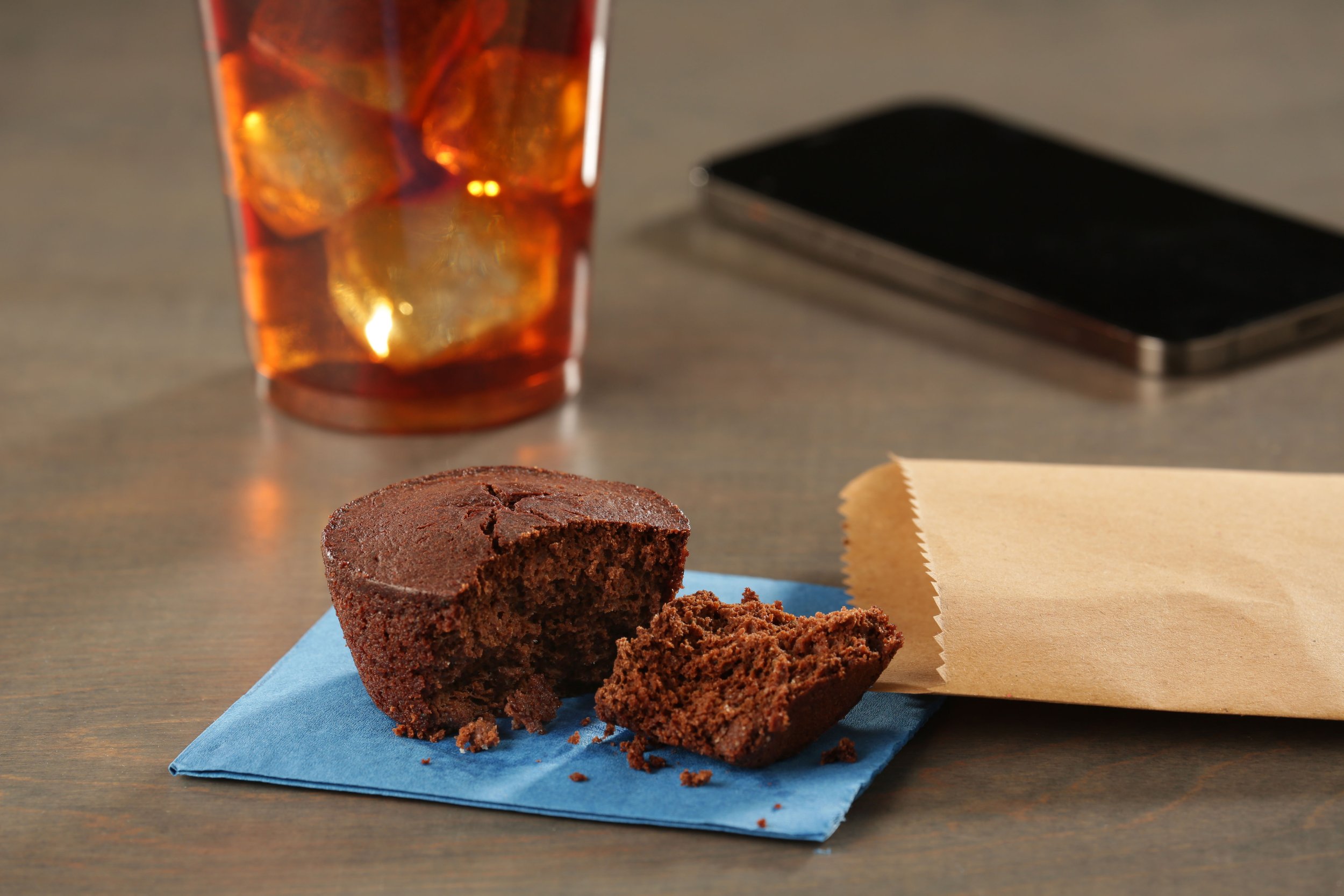 muffin broken open with open wrapper