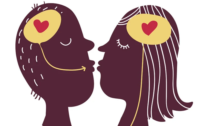 Man and woman kissing and increasing their oxytocin levels.