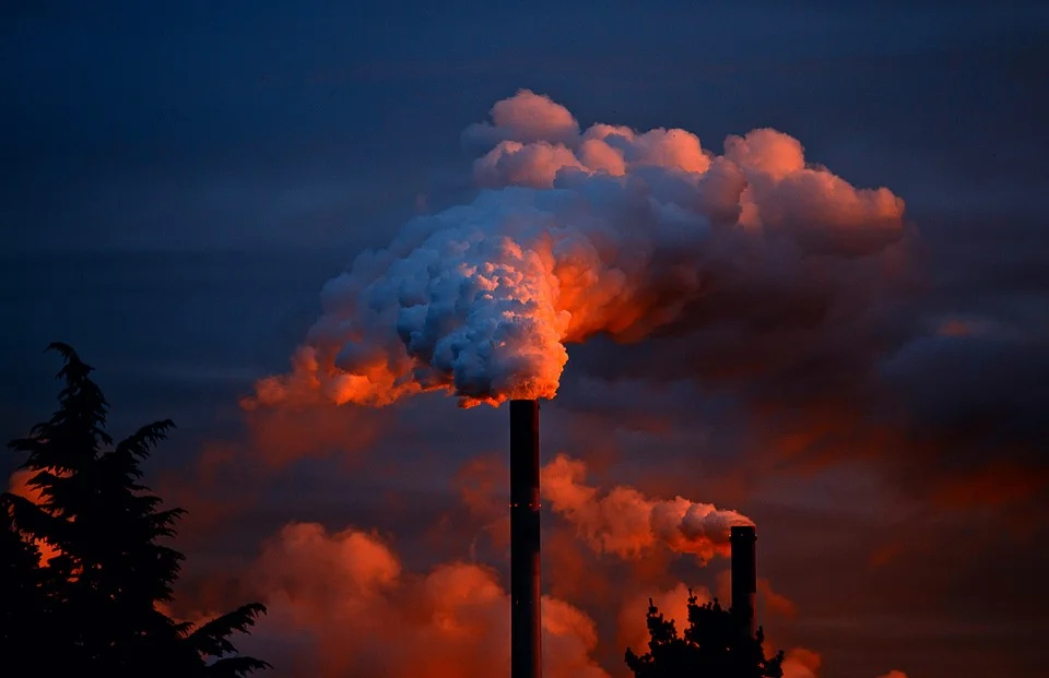 Factory emitting particulate matter and pollution, which can affect brain health.
