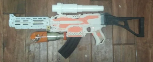 white and orange gun.jpg