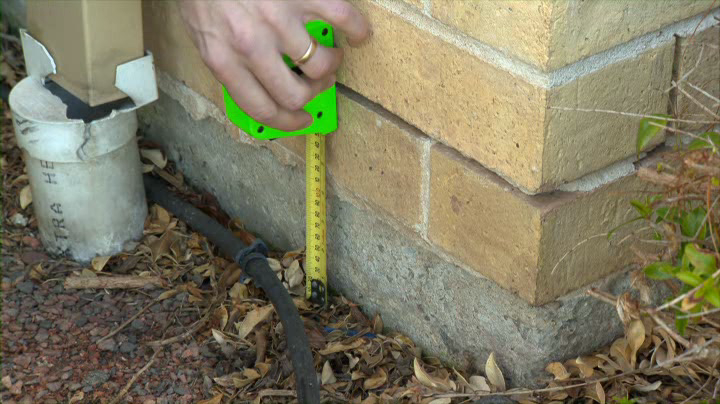 The concrete slab should be exposed by 75mm if there is no termite protection in place