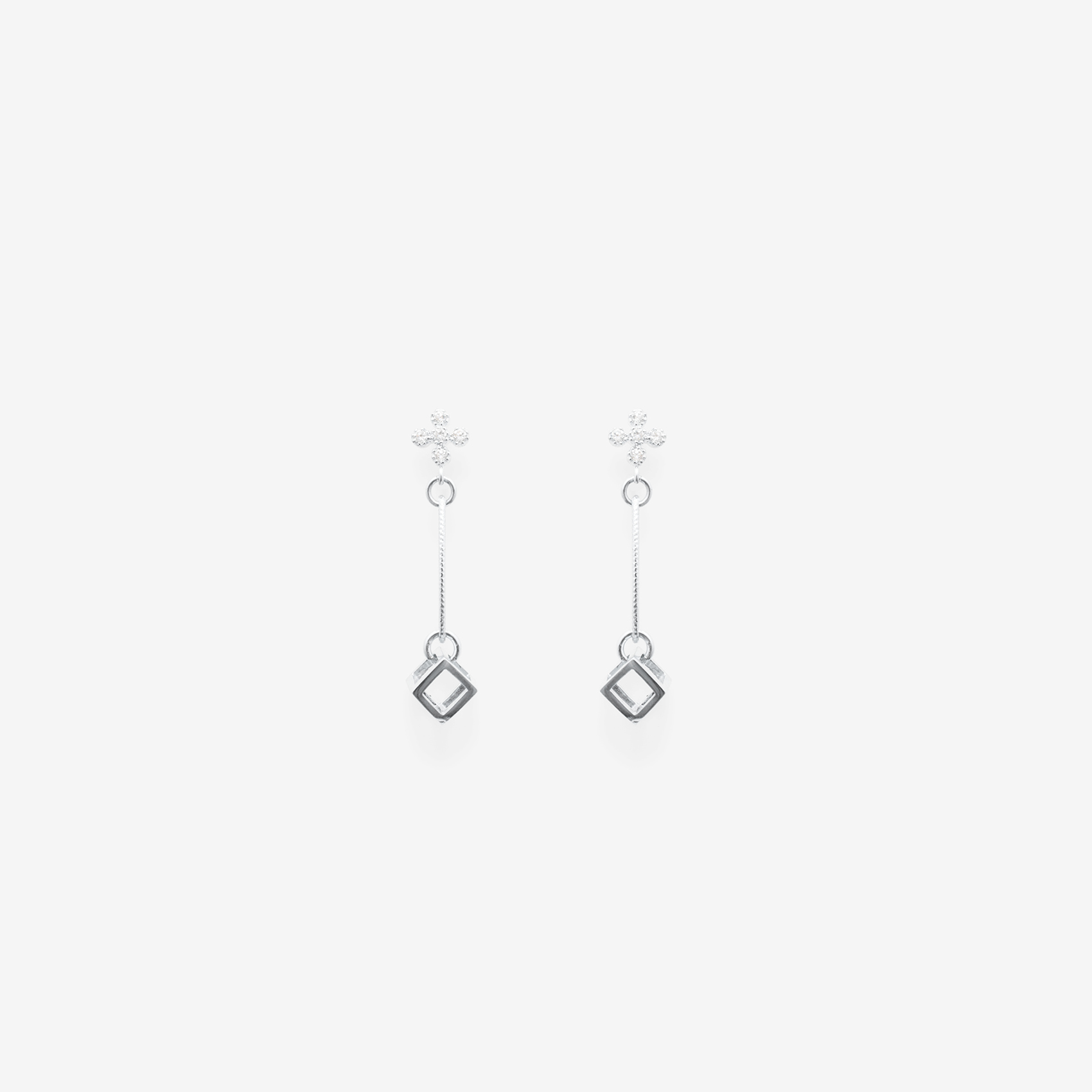 oval with dangling small cube with cubic zirconia top/silver