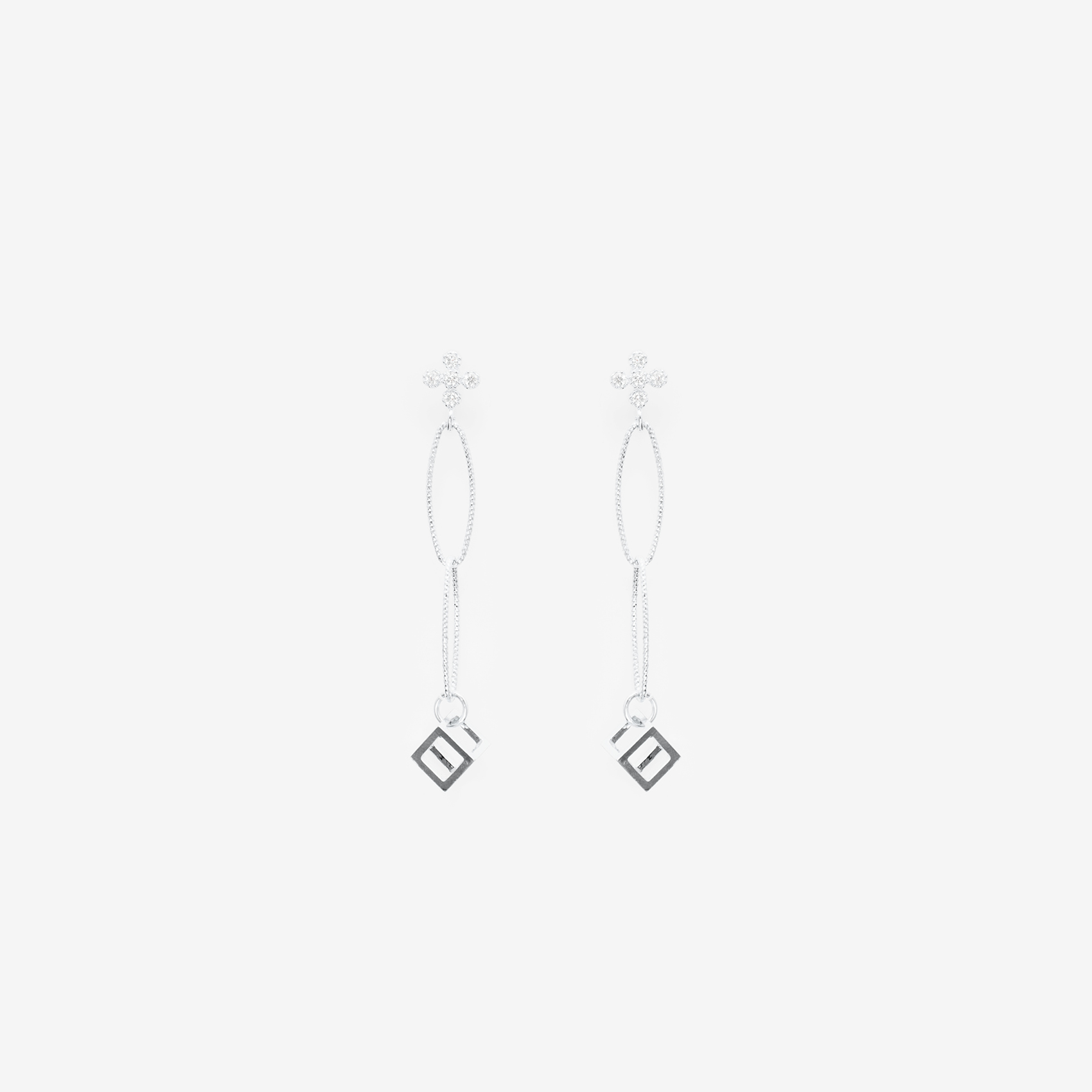 2 tier oval with dangling small cube with cubic zirconia top