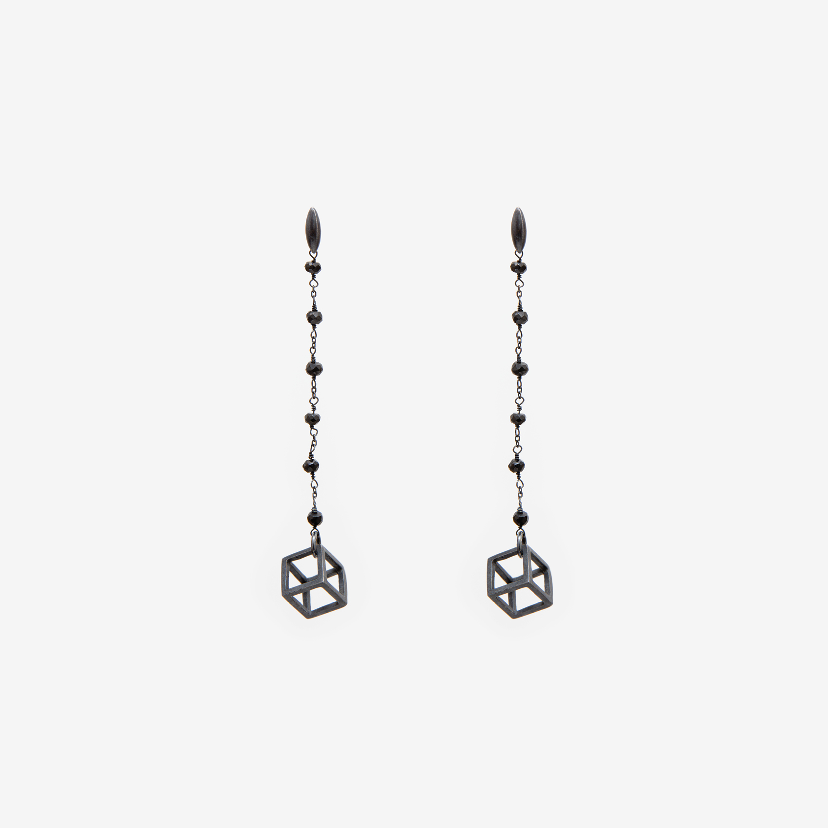 medium cube on a dangling black onyx/oxidized