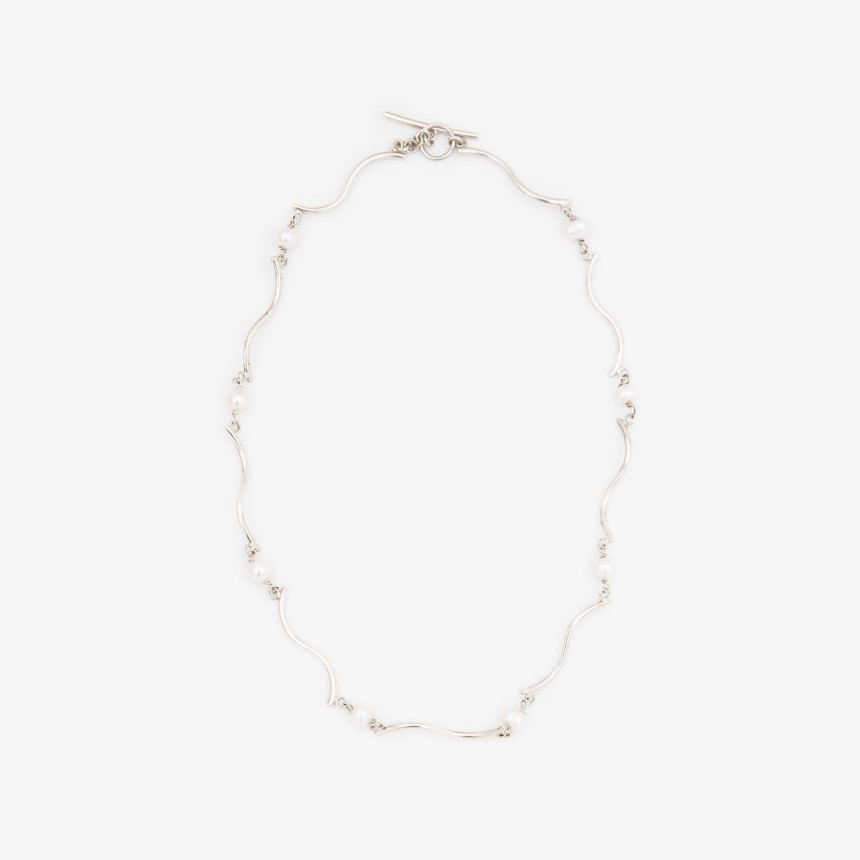 curved S-lines with pearls/silver