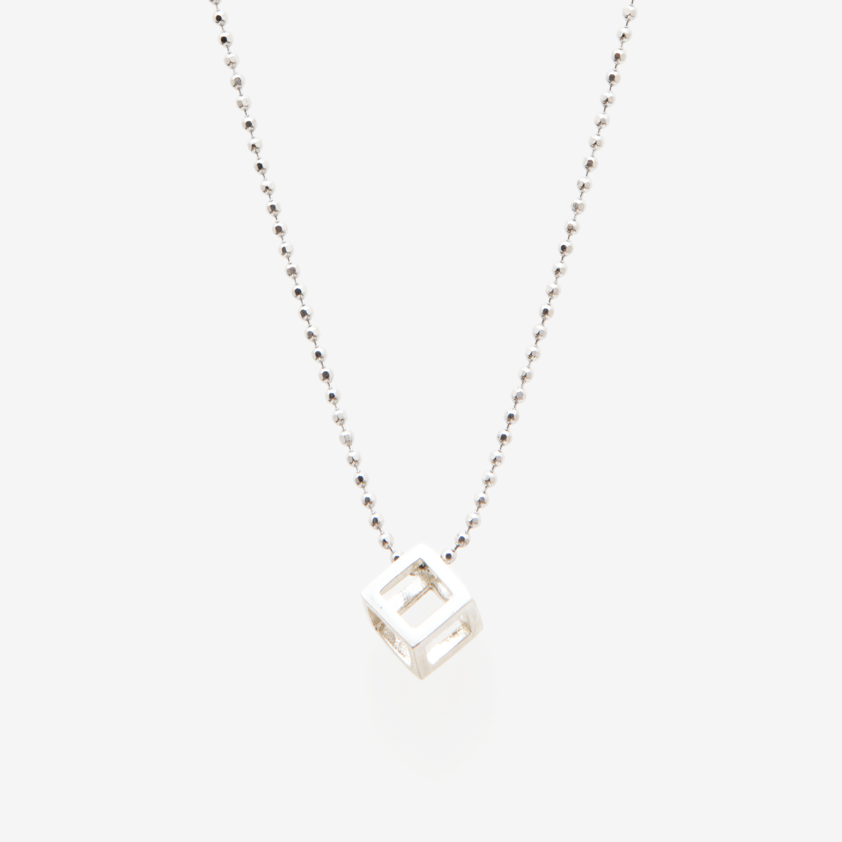 tiny cube on a ball chain/oxidized