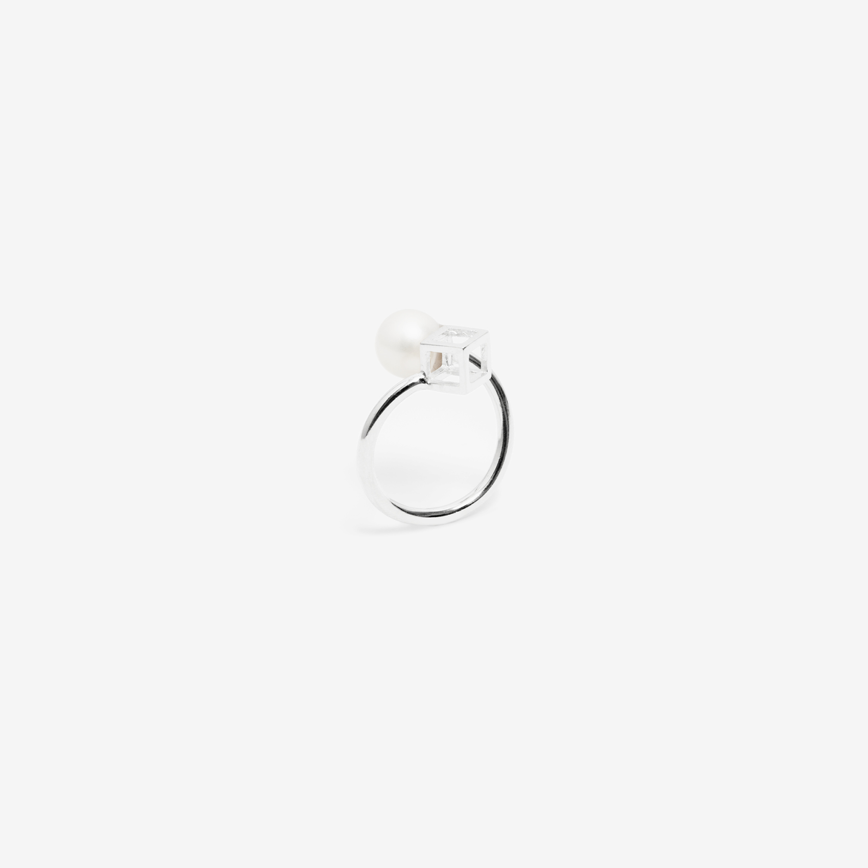 tine cube and a pearl ring