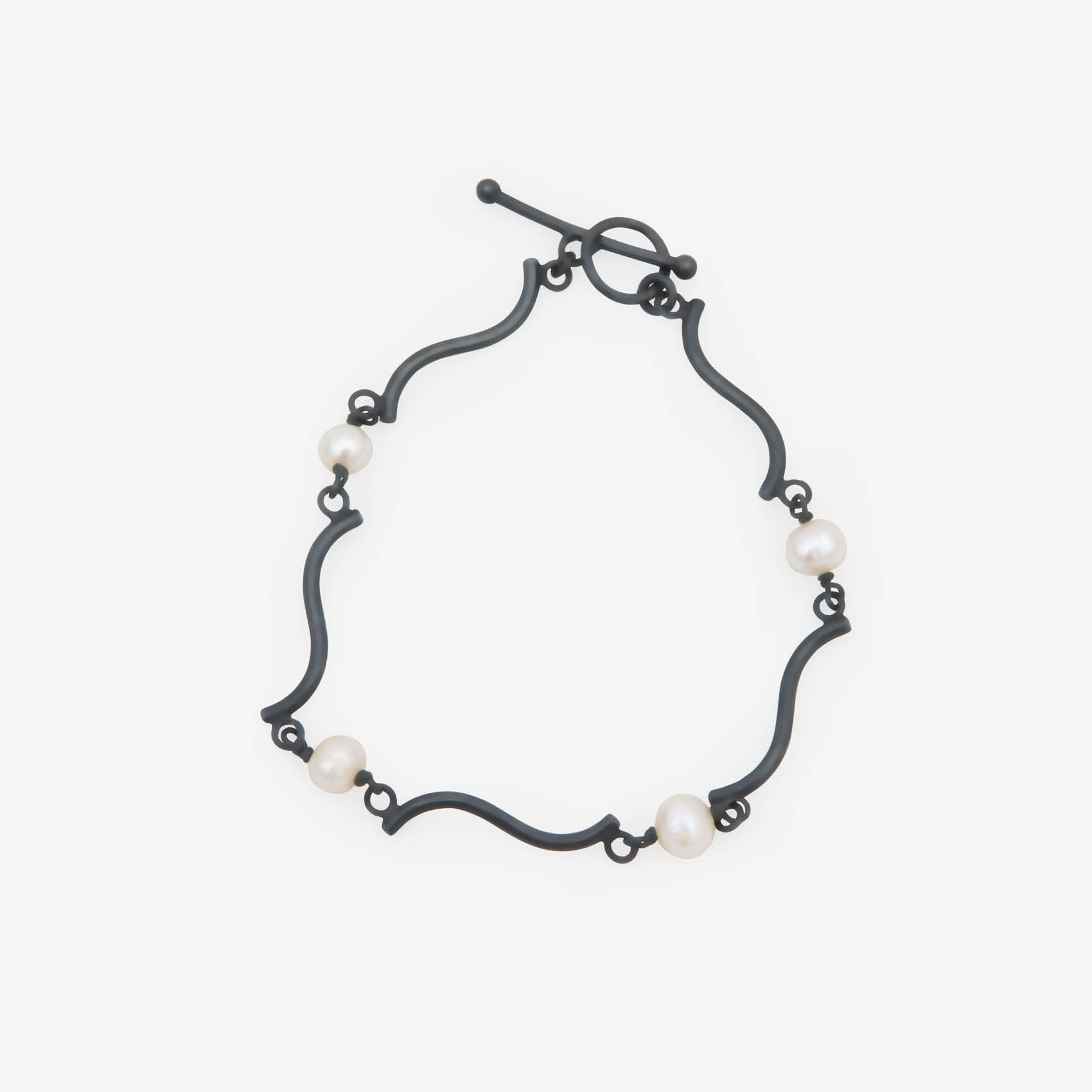 curved s-line bracelet with pearls