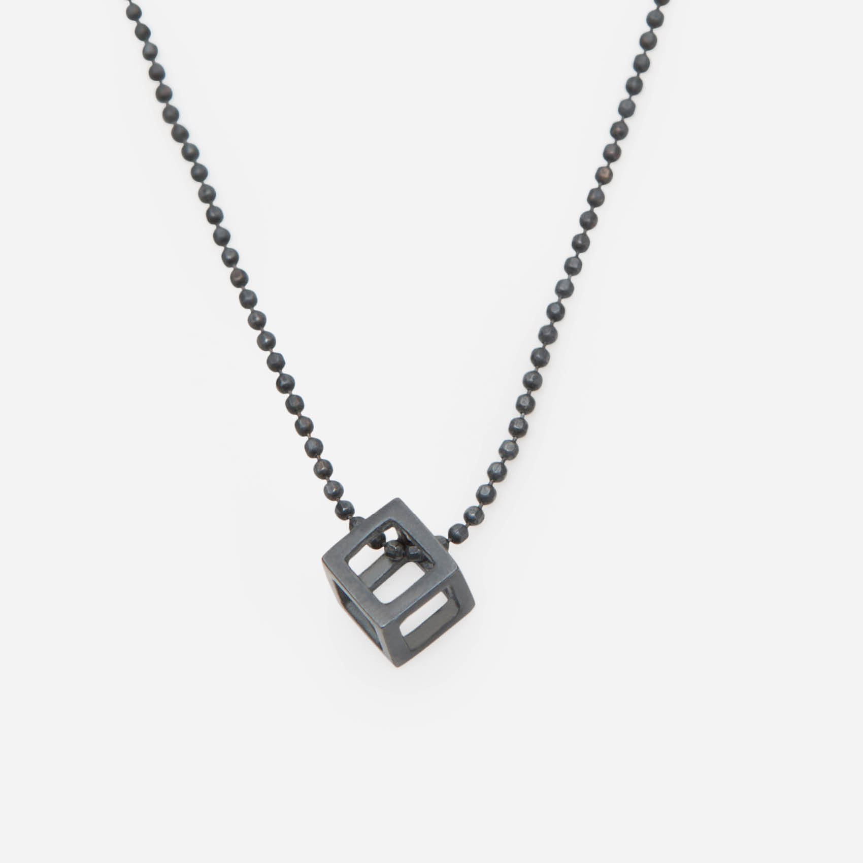 small cube on a ball chain/oxidized