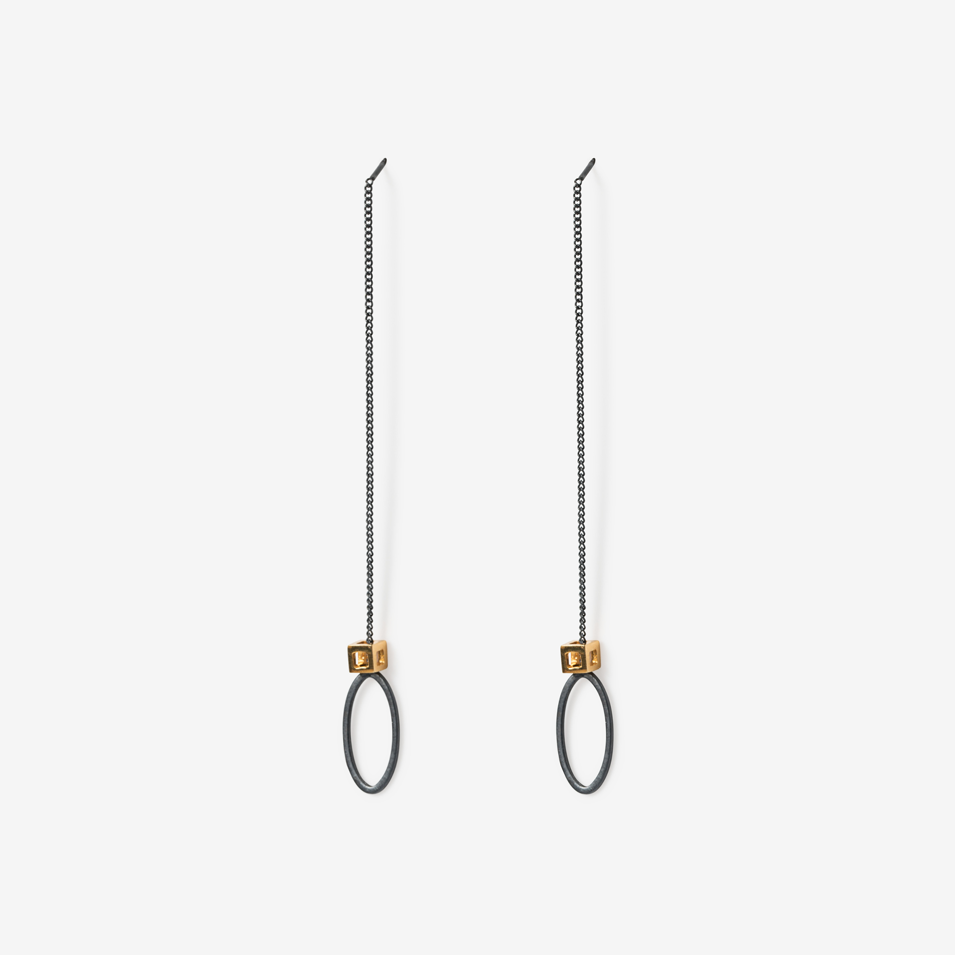 dangling oval with tiny cube