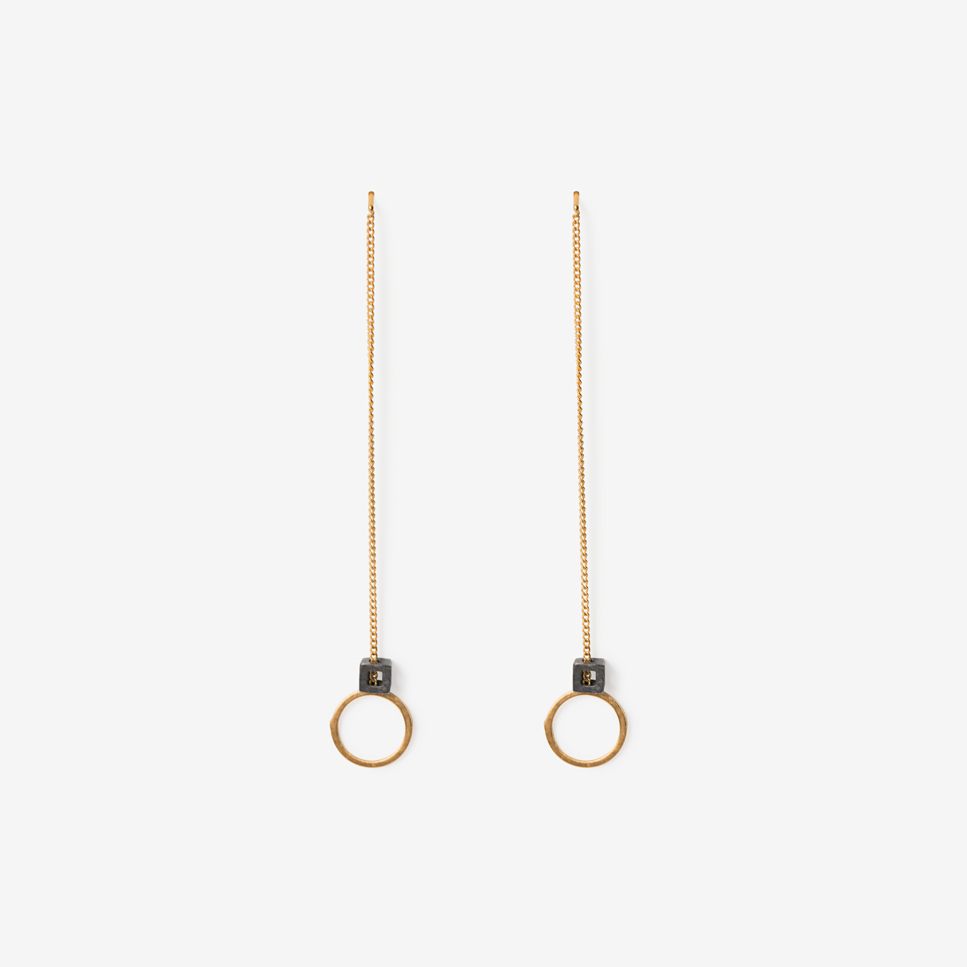 dangling circle with tiny cube