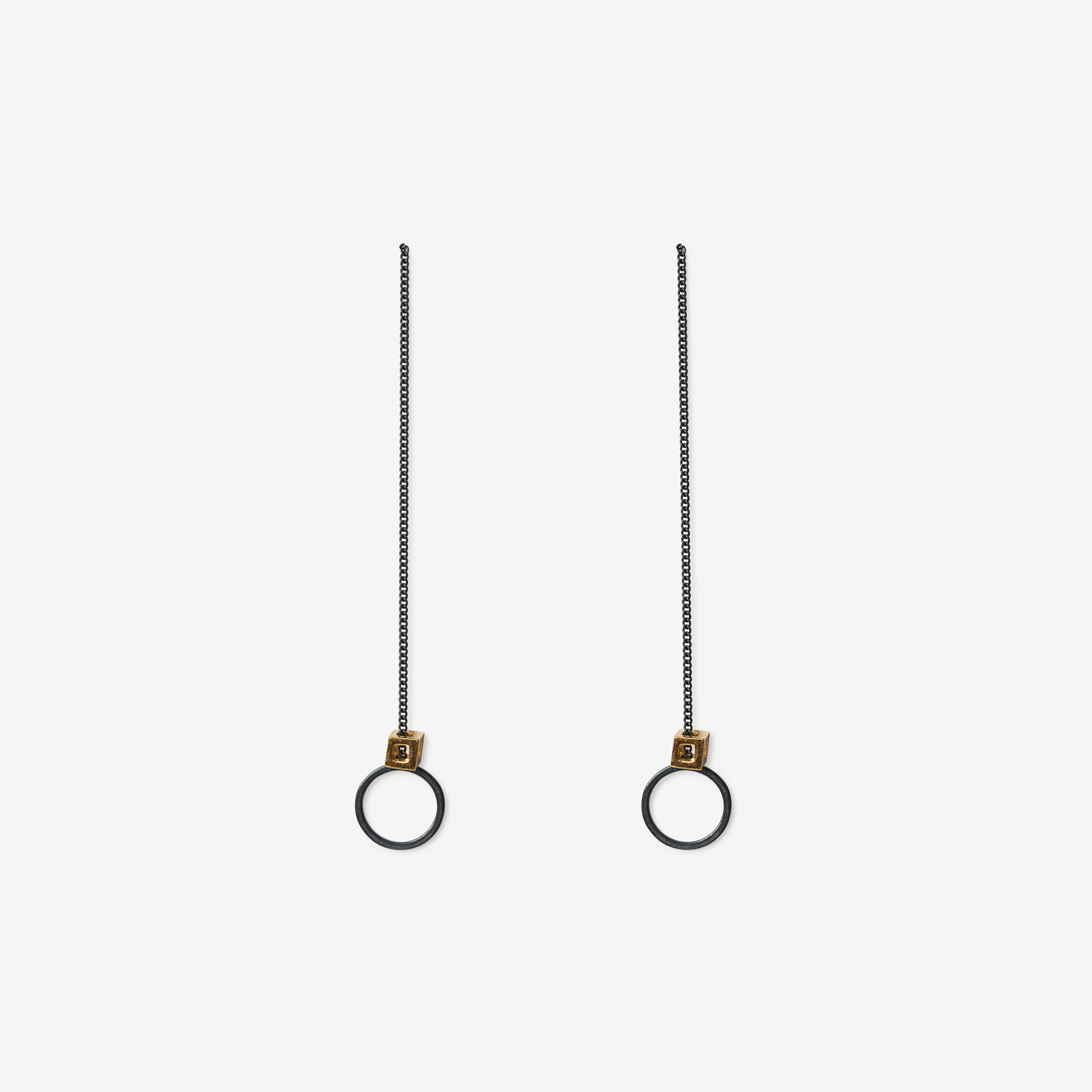 dangling circle with tiny cube