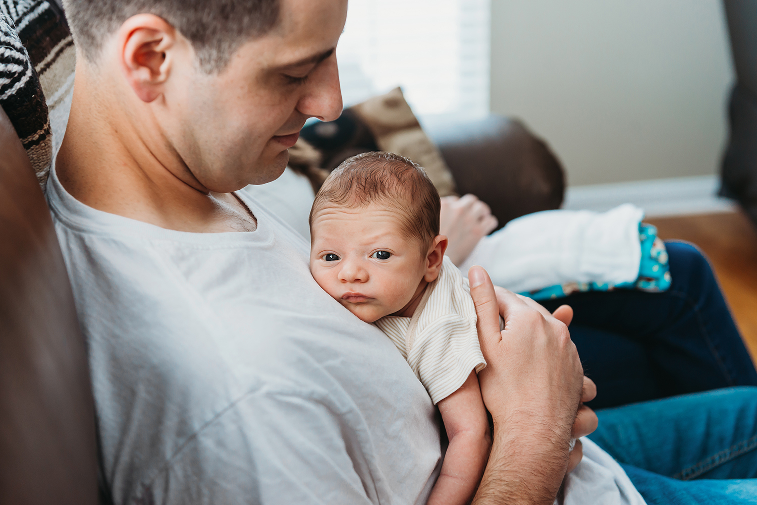 new father holding son virginia lifestyle photography.jpg